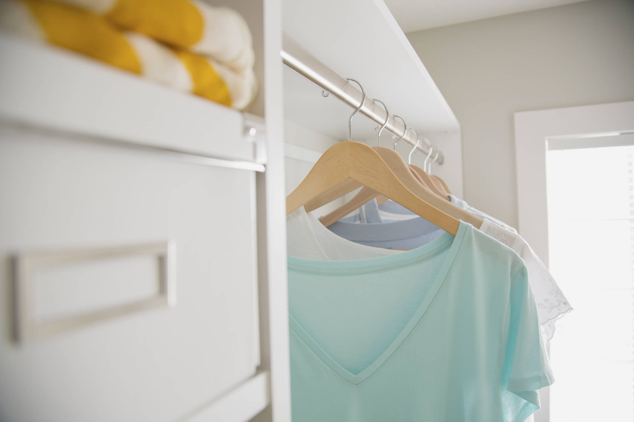 close up of cotton clothing on hangers